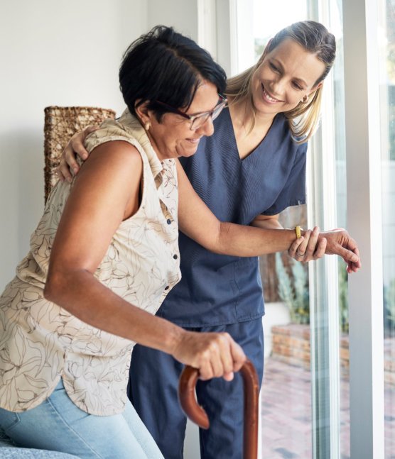 caregiver assisting senior