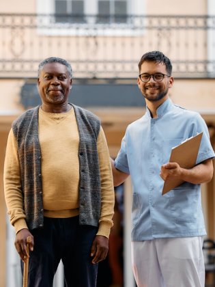 caregiver and senior smiling