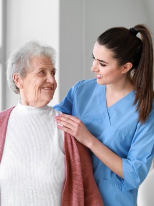 caregiver looking to senior