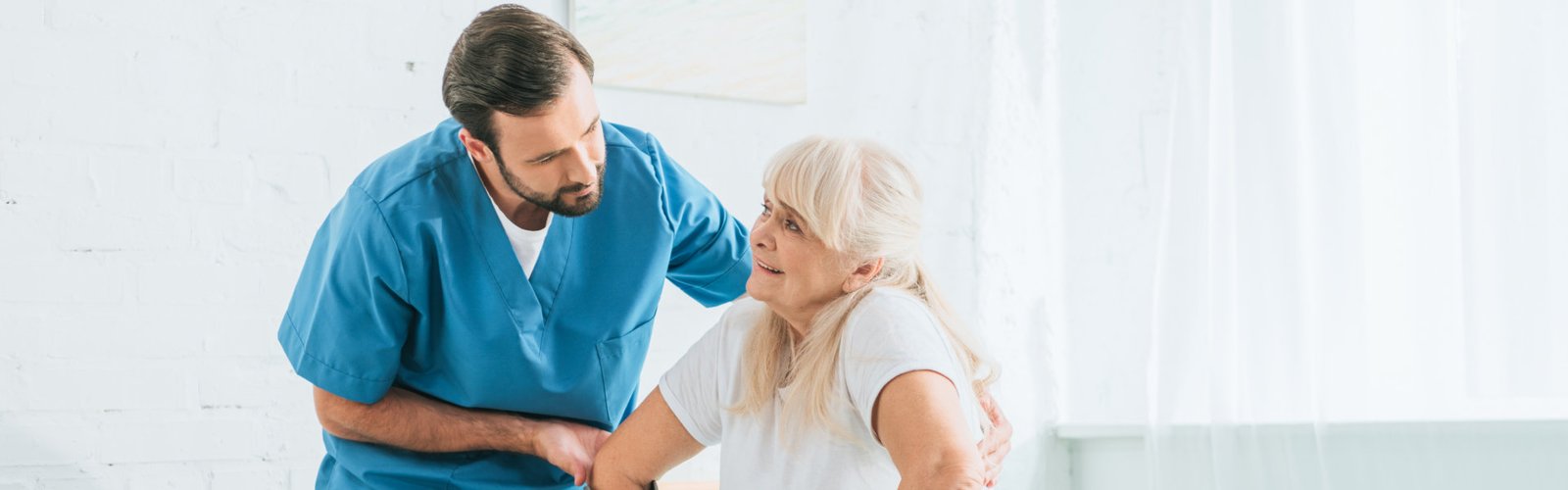 caregiver assisting senior